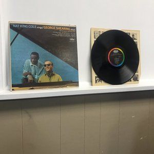 Nat King Cole sings  George Shearing plays